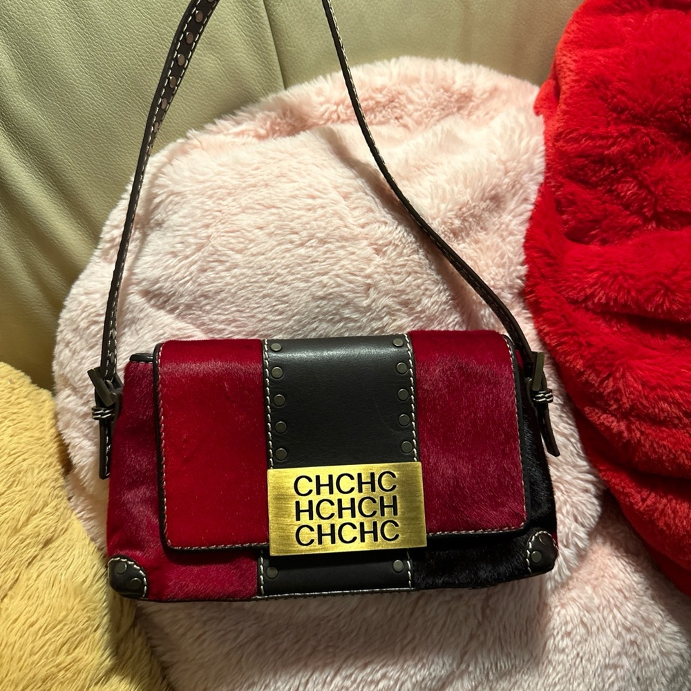 RARE Carolina Herrera satchel bag unique. A red colored bag with gold hardware